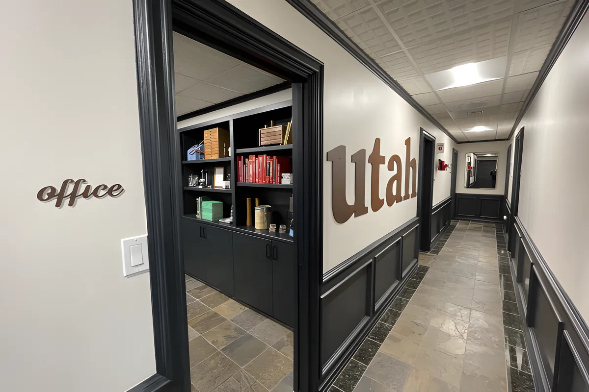 Navy-paneled hallway inside the Hill Family Dental office